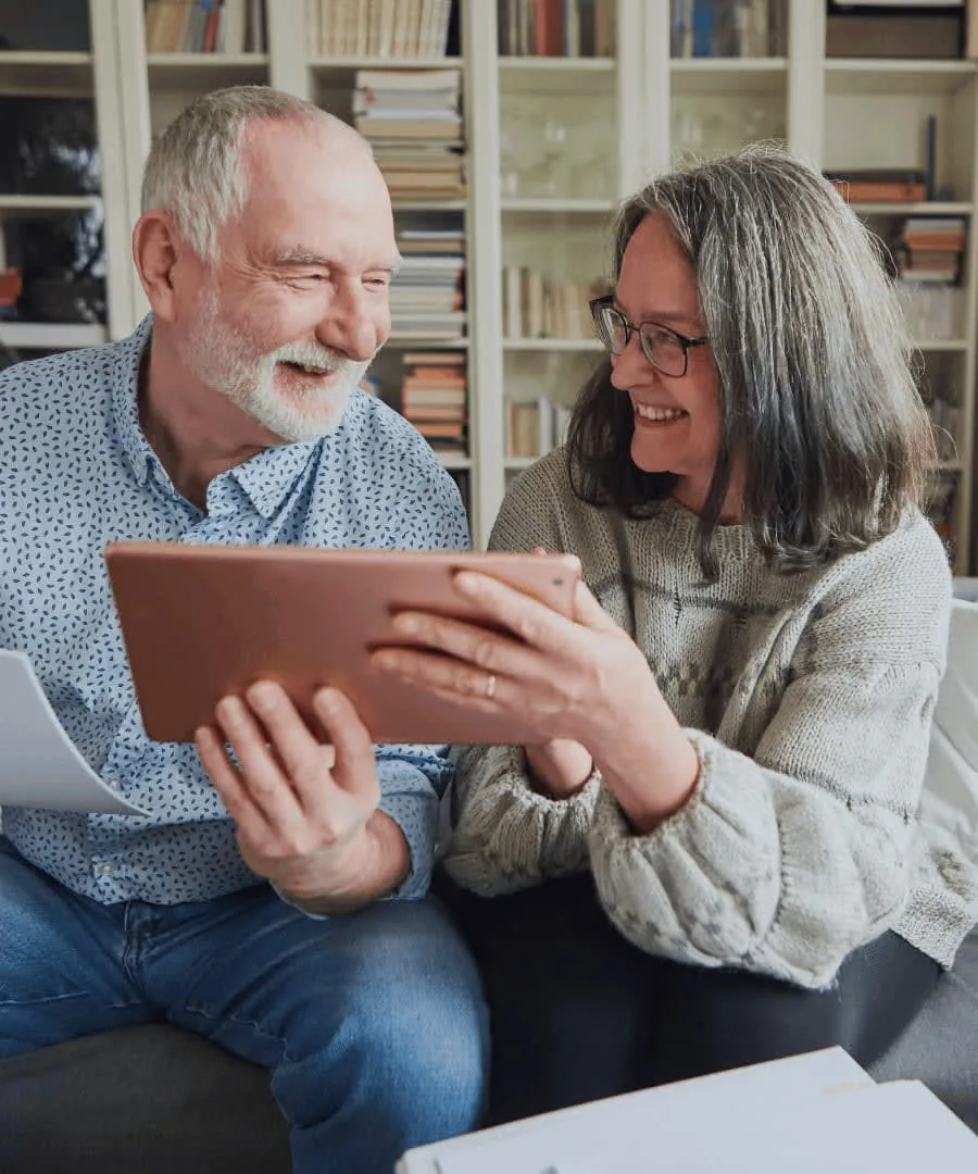 Home health aide assisting a senior at home in Albuquerque