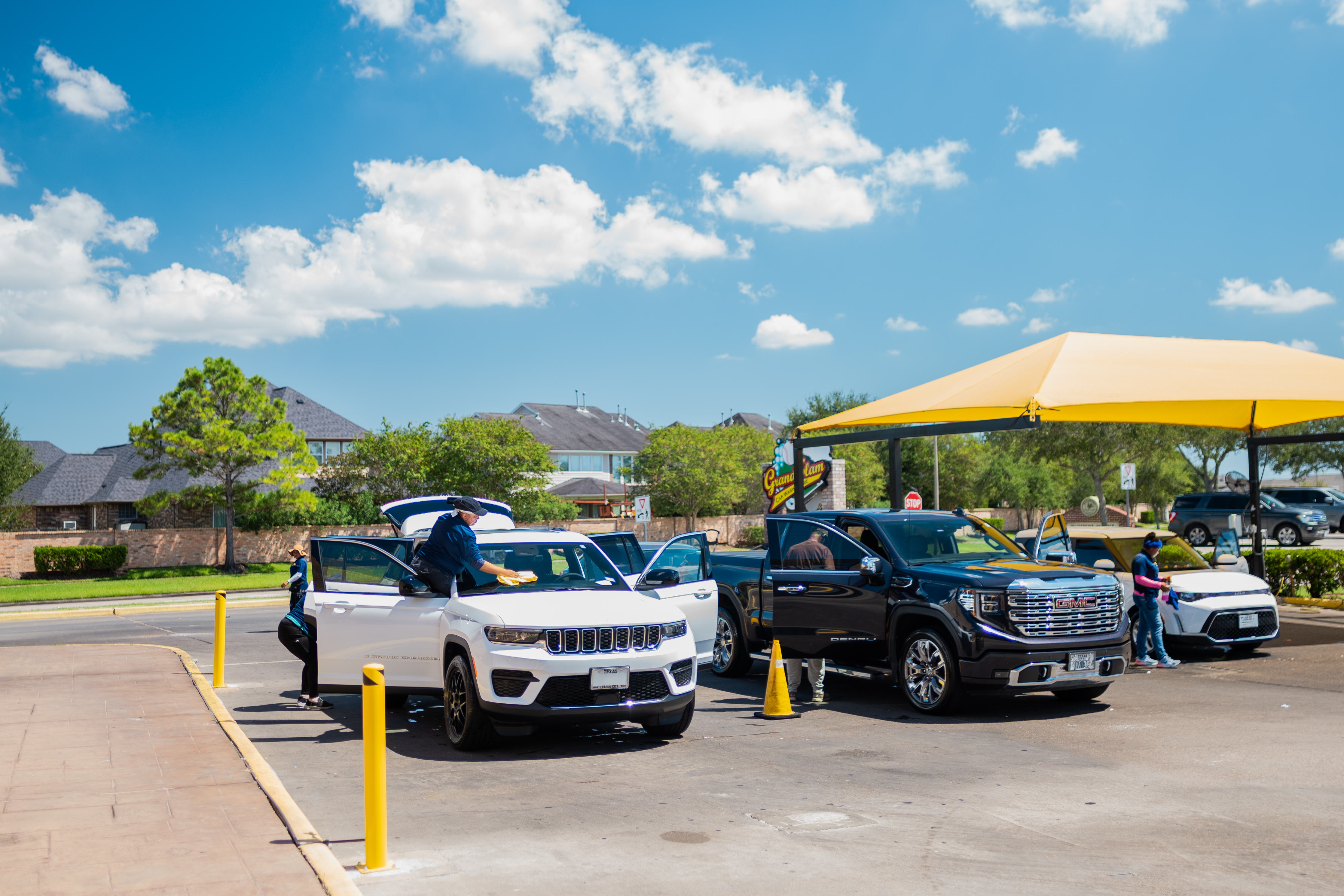 Grand Slam full-service vehicle detailing — hand waxing and paint correction