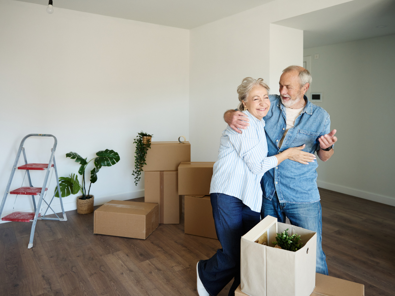 Recent homeowners reviewing their new home together