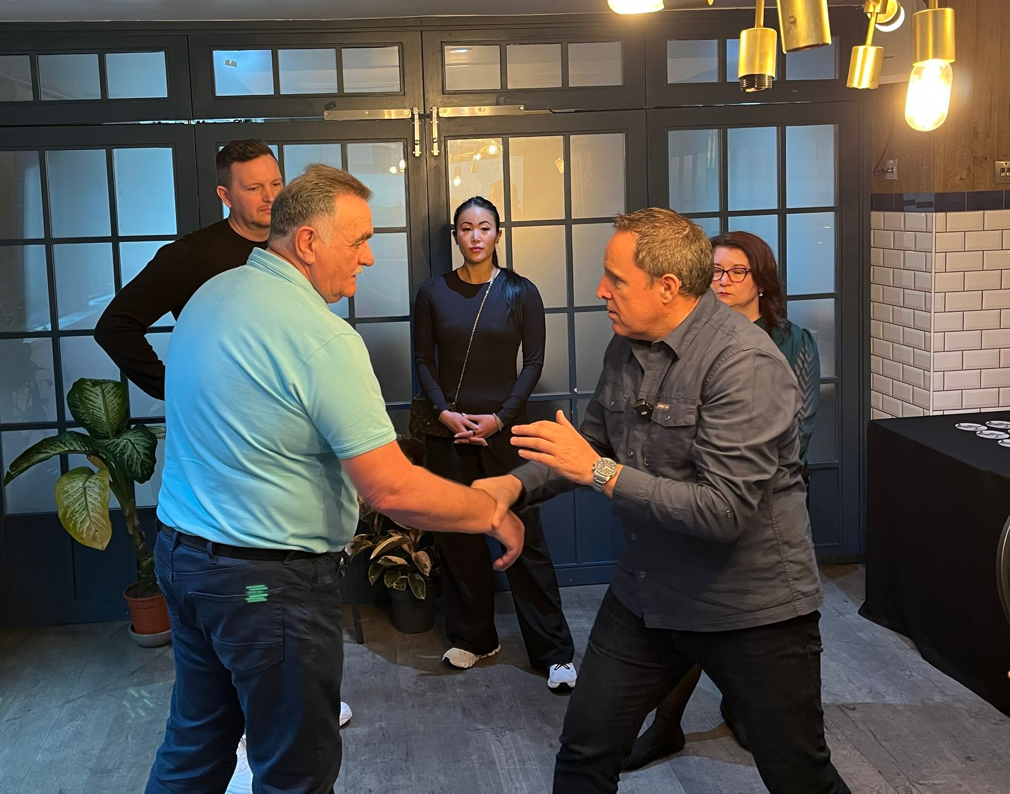 Richard Barker coaching students in hypnosis