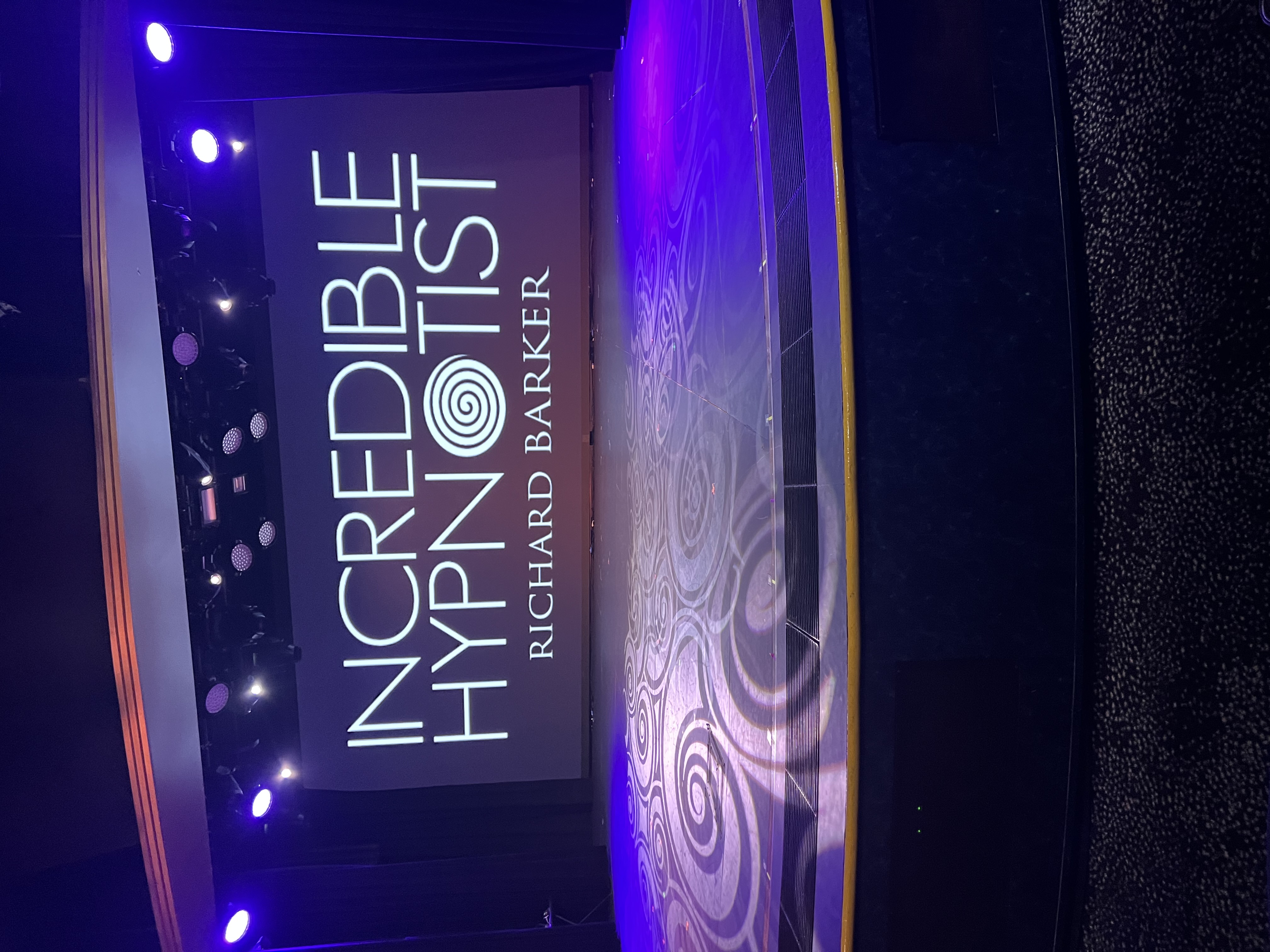 Hire a comedy hypnotist Manchester, Richard Barker entertaining corporate event audience