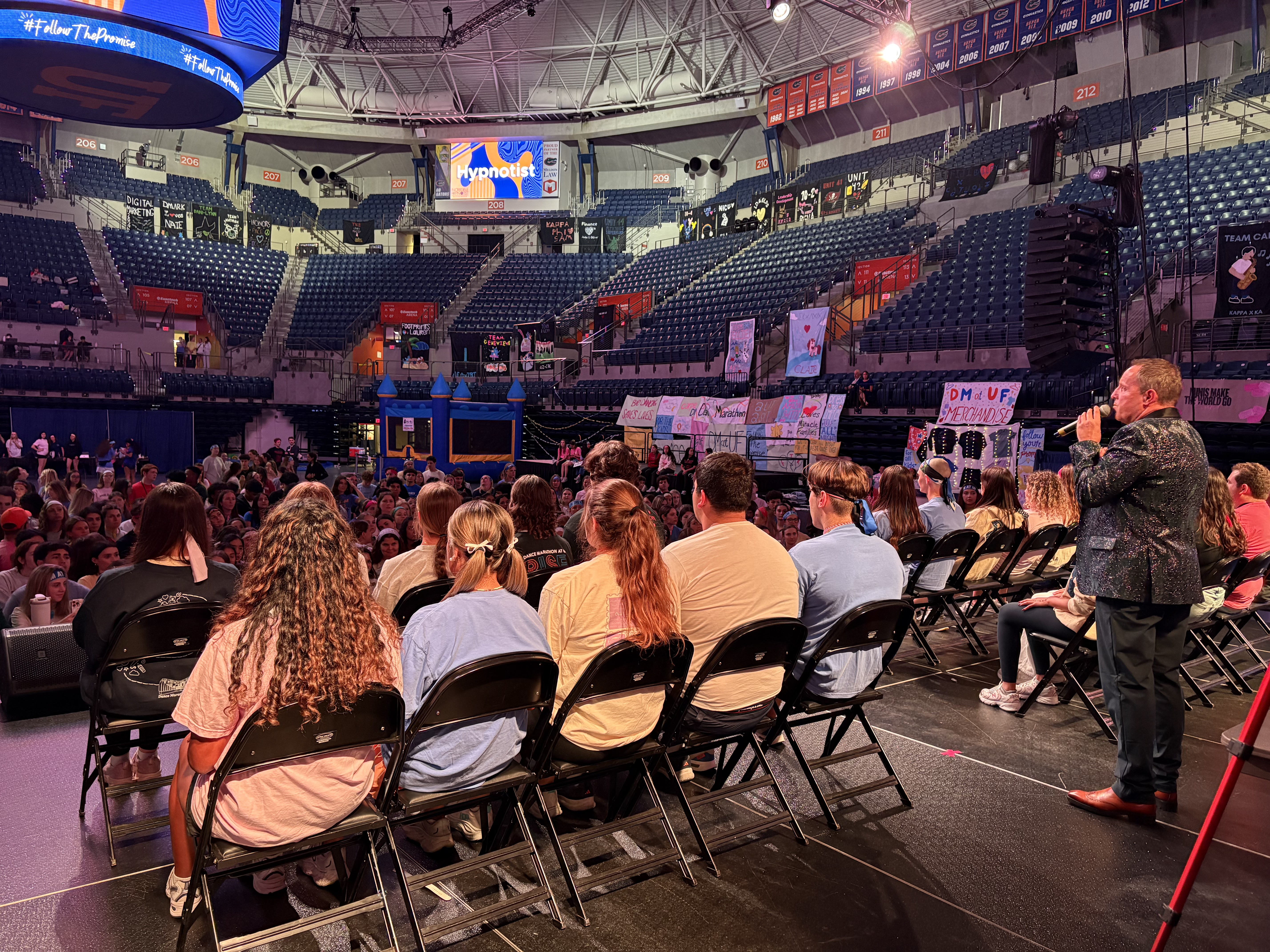 Hire a comedy hypnotist Glasgow, Richard Barker performing high-energy stage show in Scotland