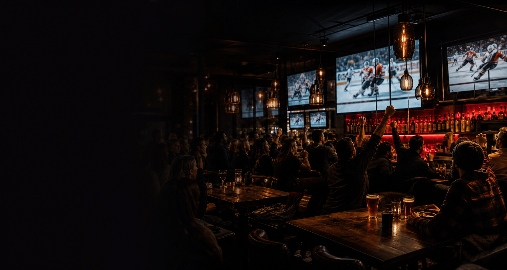 Guests watching the game on big screens at Spot 23