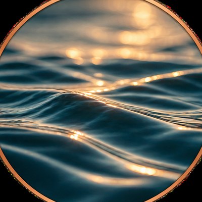 Gentle ocean ripples catching the light