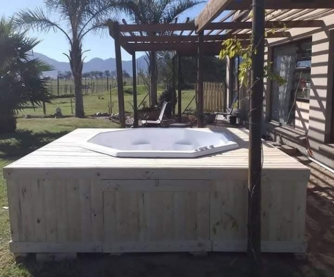 Jacuzzi installation with timber surround