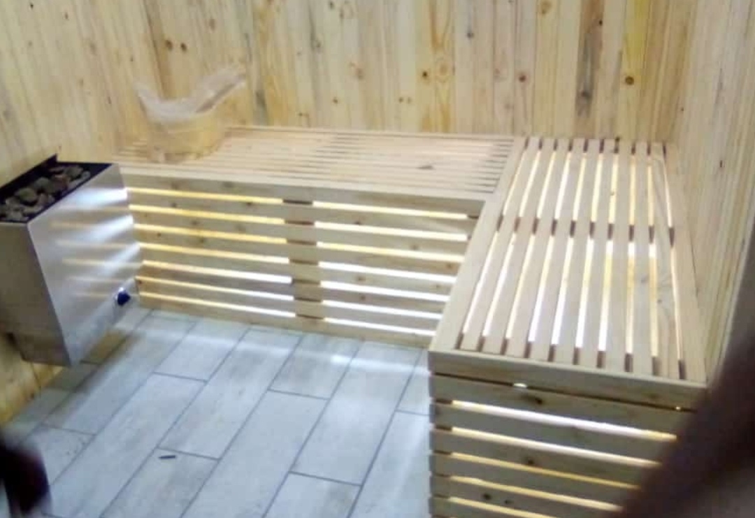 Timber sauna benches and heater