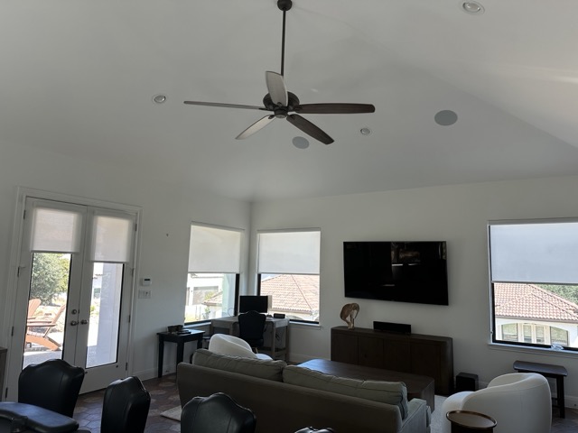 Open living room with freshly painted high ceiling and walls by Easy Peasy Painting, San Antonio TX