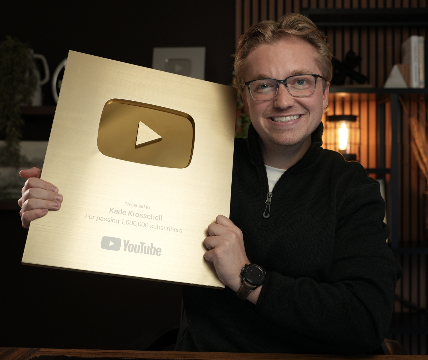 Kade Krosschell holding a YouTube Gold Creator Award