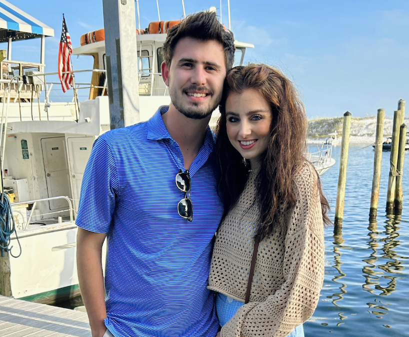 Hunter Thorne with his wife at a marina