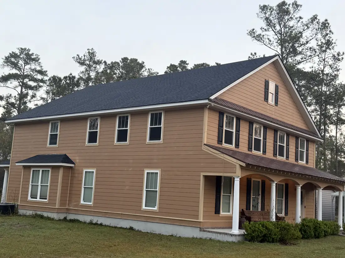 Completed architectural shingle roof replacement on a two-story Savannah home