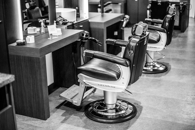 Barber chairs on the floor at Design Plus
