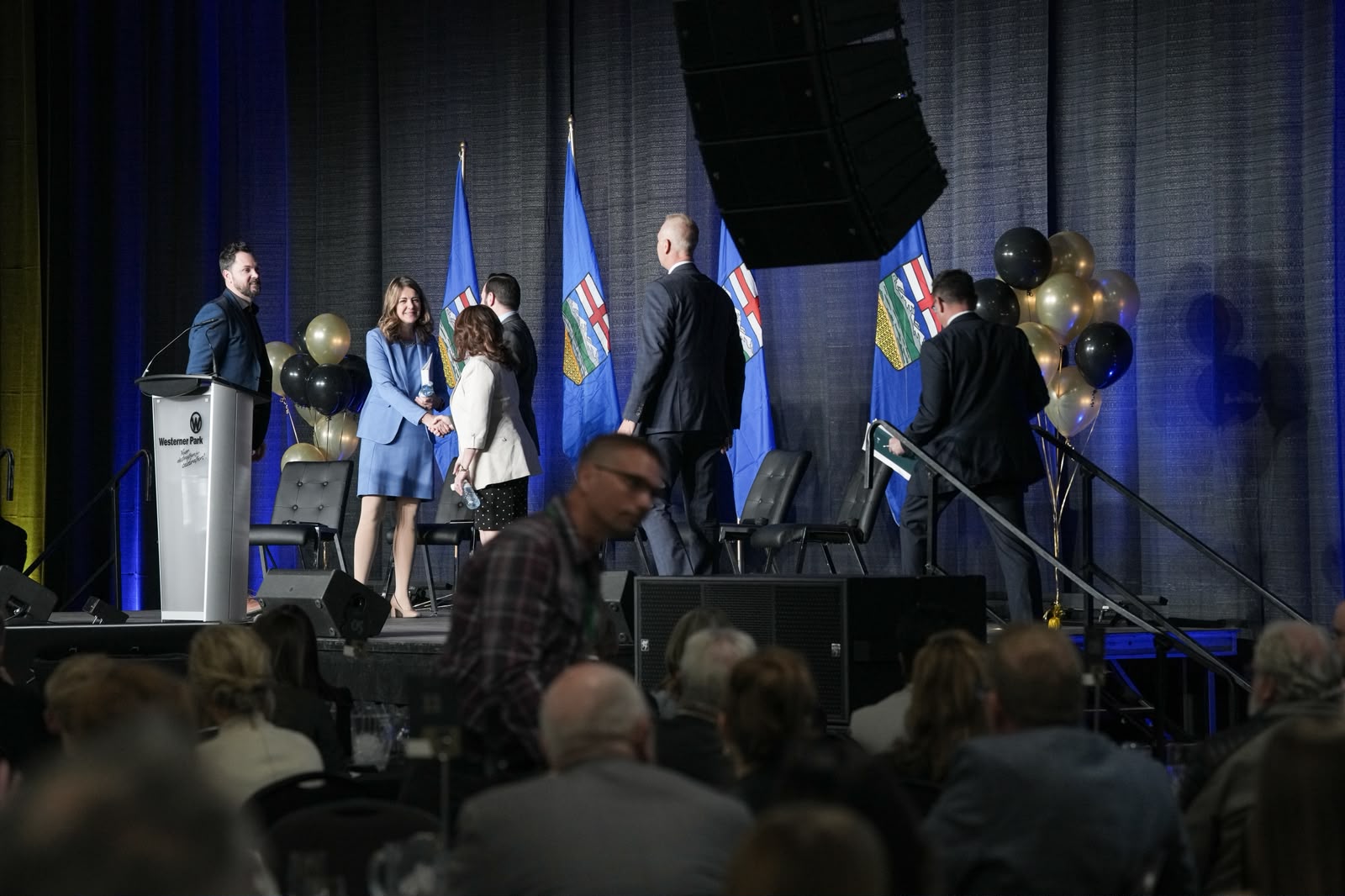 Speaker addressing the Alberta Summit