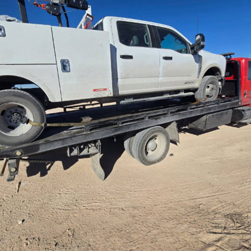 Heavy-duty towing company in West Odessa, TX, moving commercial truck