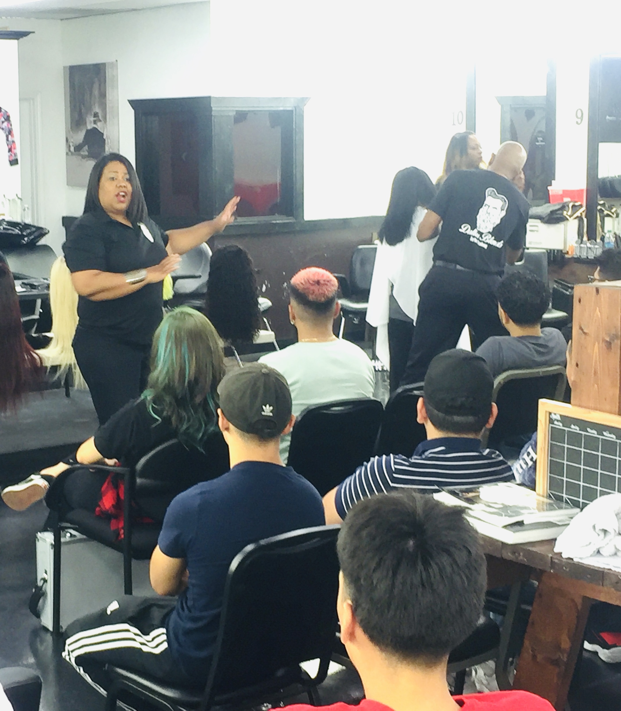 Coach Tiff in barber college