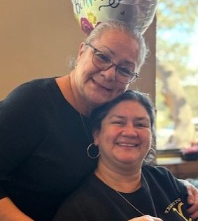 A picture of the owner, Rachel, and a family member.