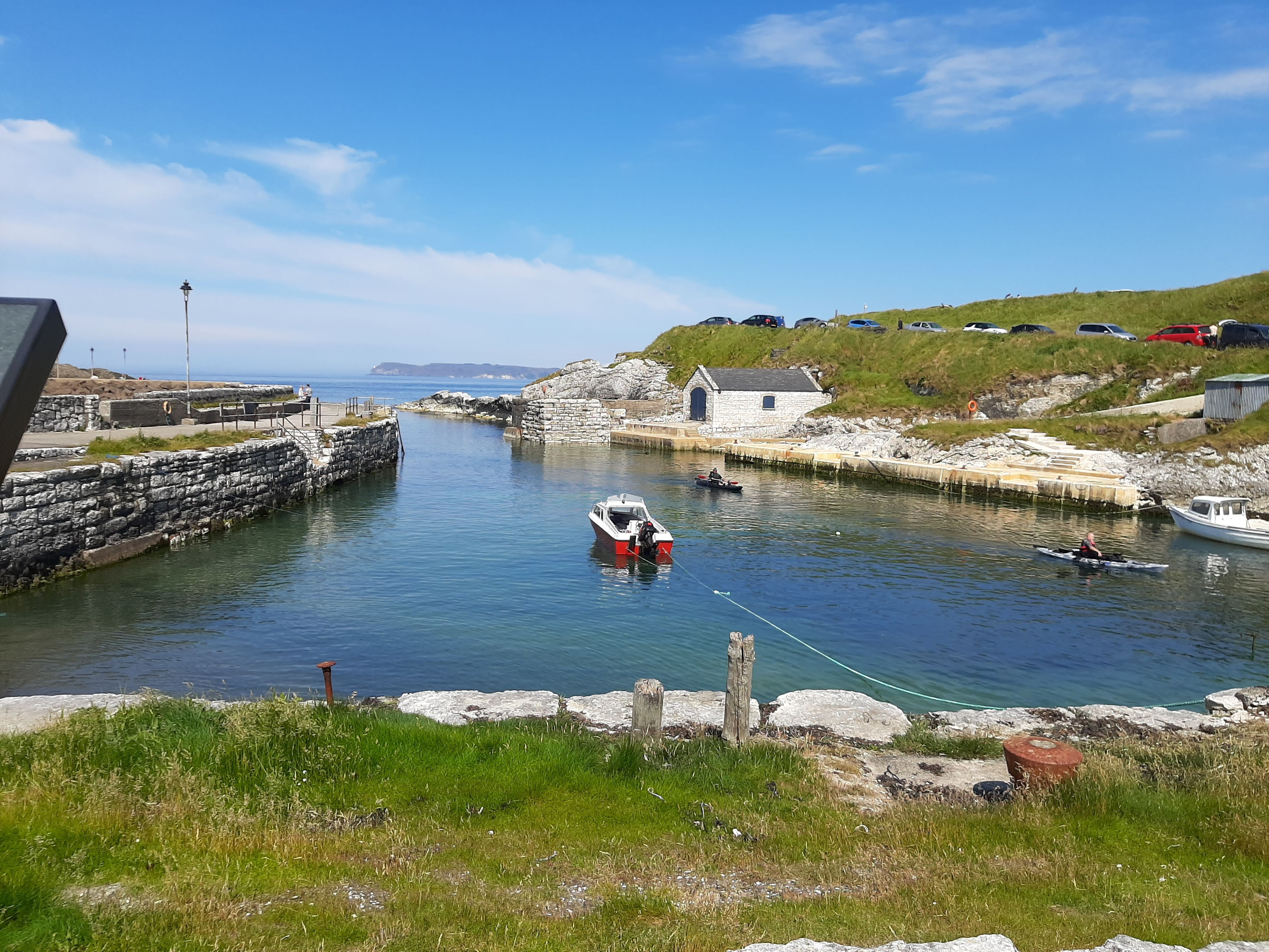 Ballintoy Harbour entrance with boats
