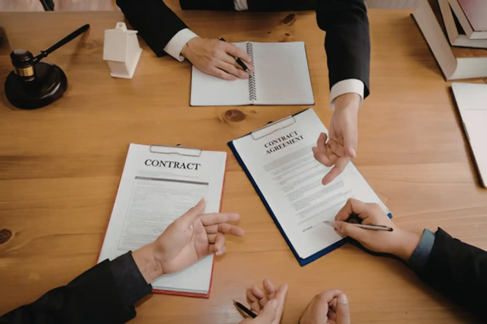 Real estate partners signing a contract
