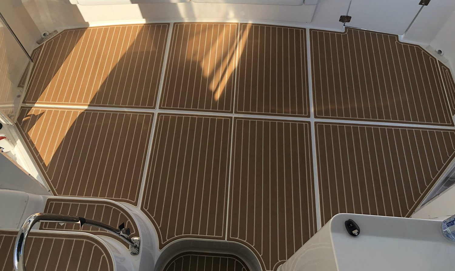 birds eye photography of boat on body of water