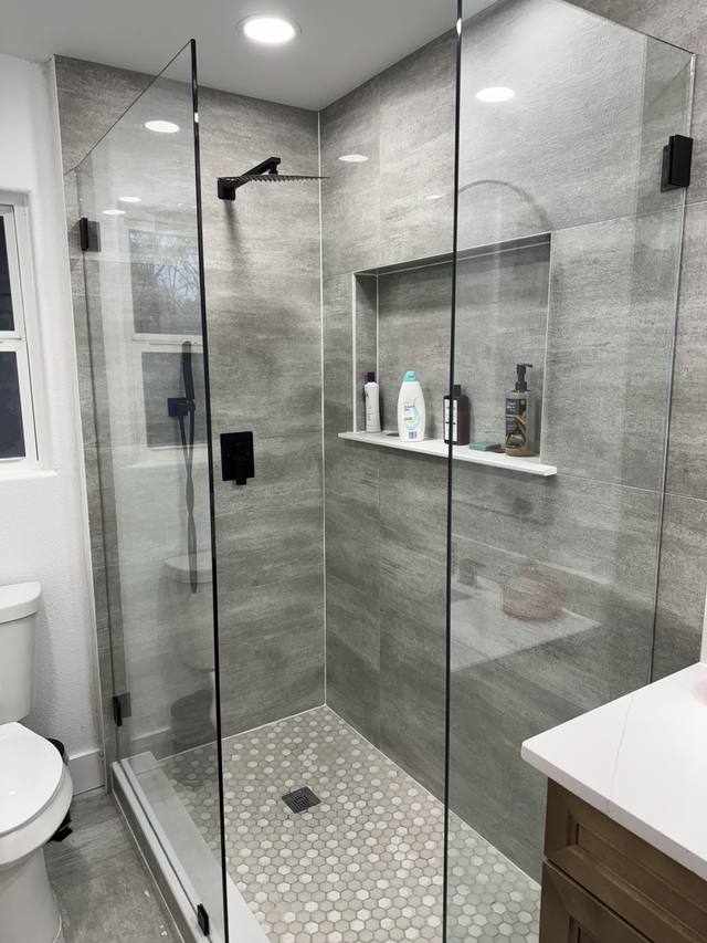 Frameless shower enclosure installed by Texas Glass Republic