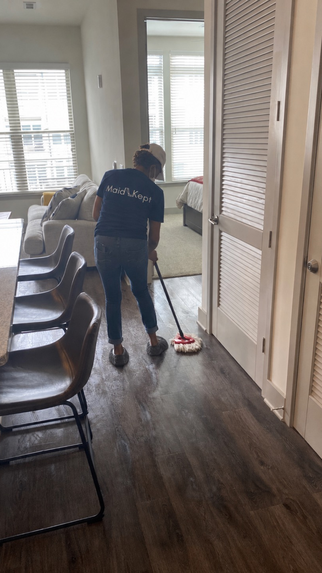 A Keeper mopping floors