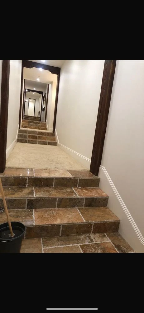 CH Cleaning Services — Interior hallway and tiled staircase