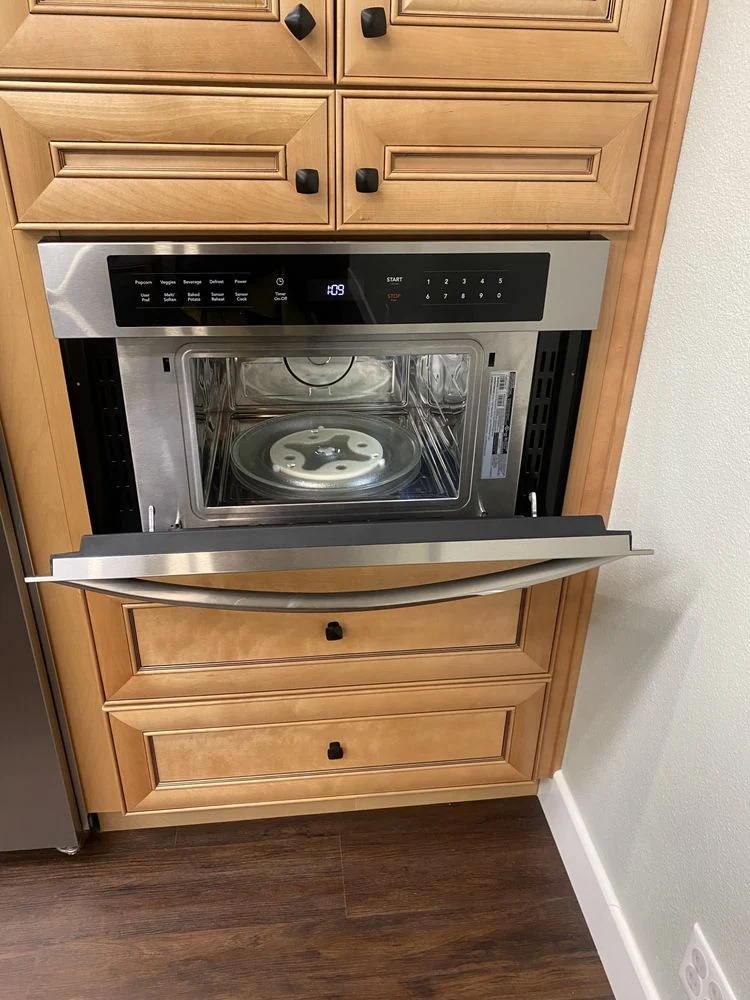 CH Cleaning Services — Built-in microwave and wood cabinetry