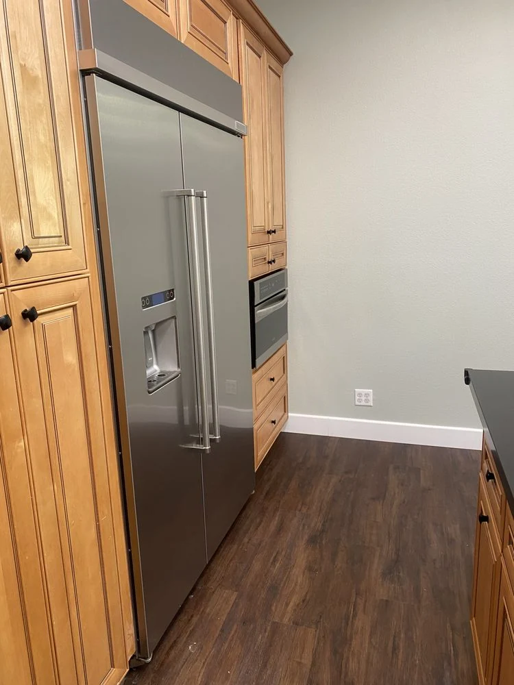 CH Cleaning Services — Residential kitchen with stainless refrigerator