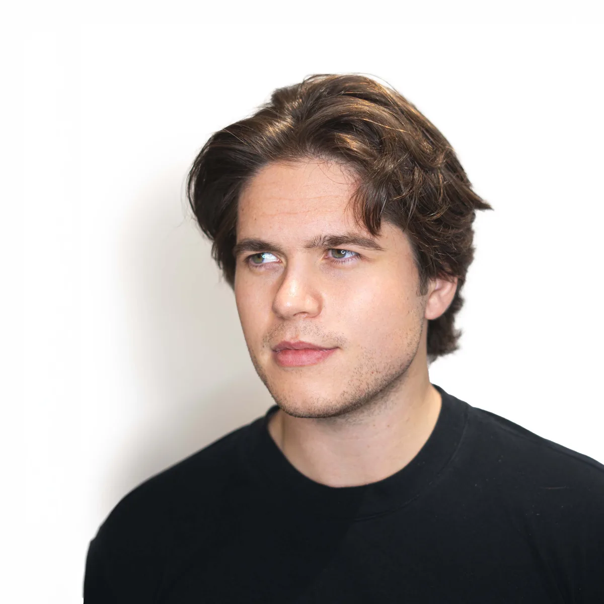 Men's long hair with scissor-cut layers and natural movement — cut by Studio AZ Barbershop, North Loop Minneapolis