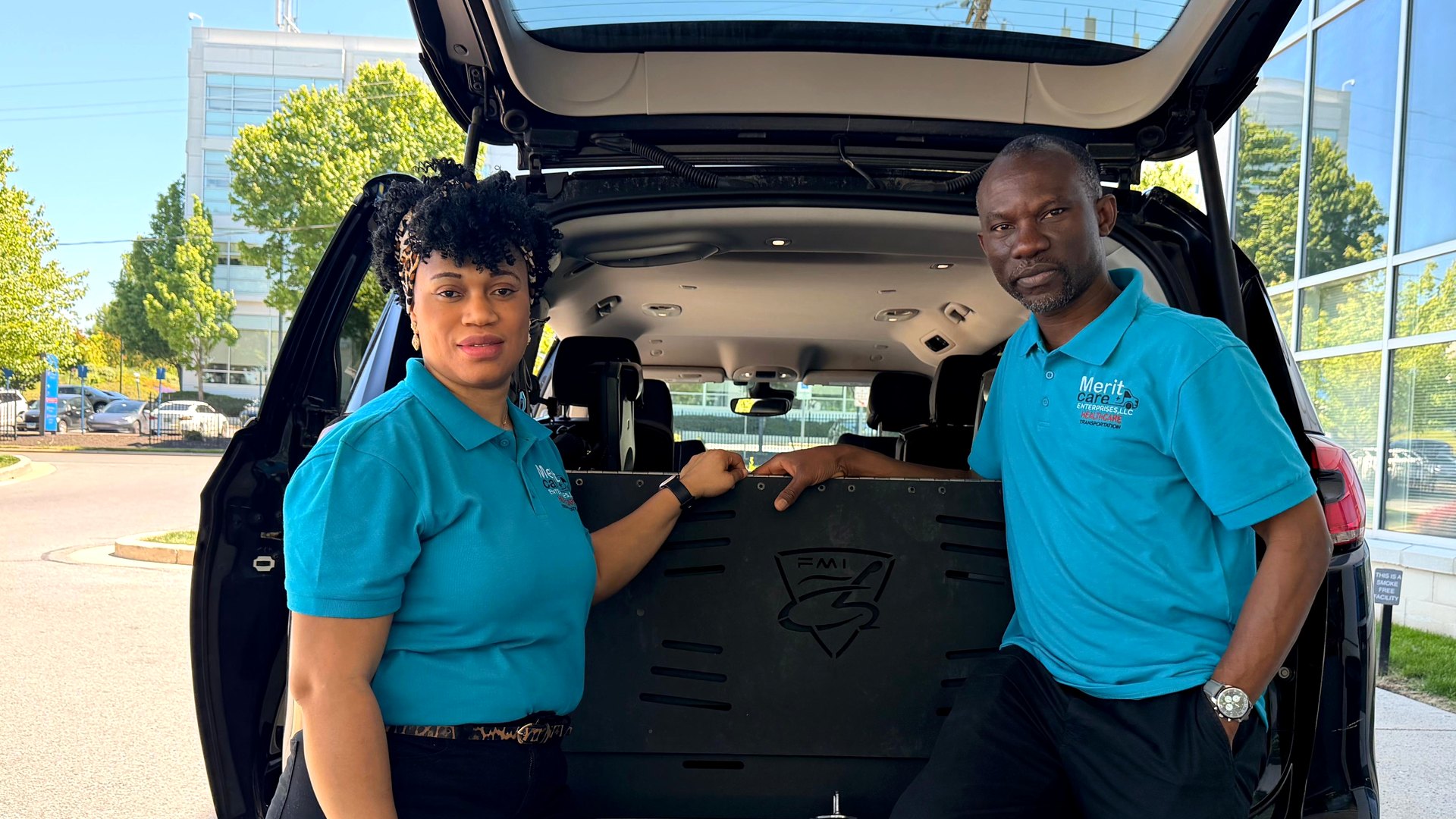 Meshach and Rita Aneke, the Registered Nurse founders of Merit Care Enterprises, at the back of their wheelchair-accessible transportation van in the Baltimore area