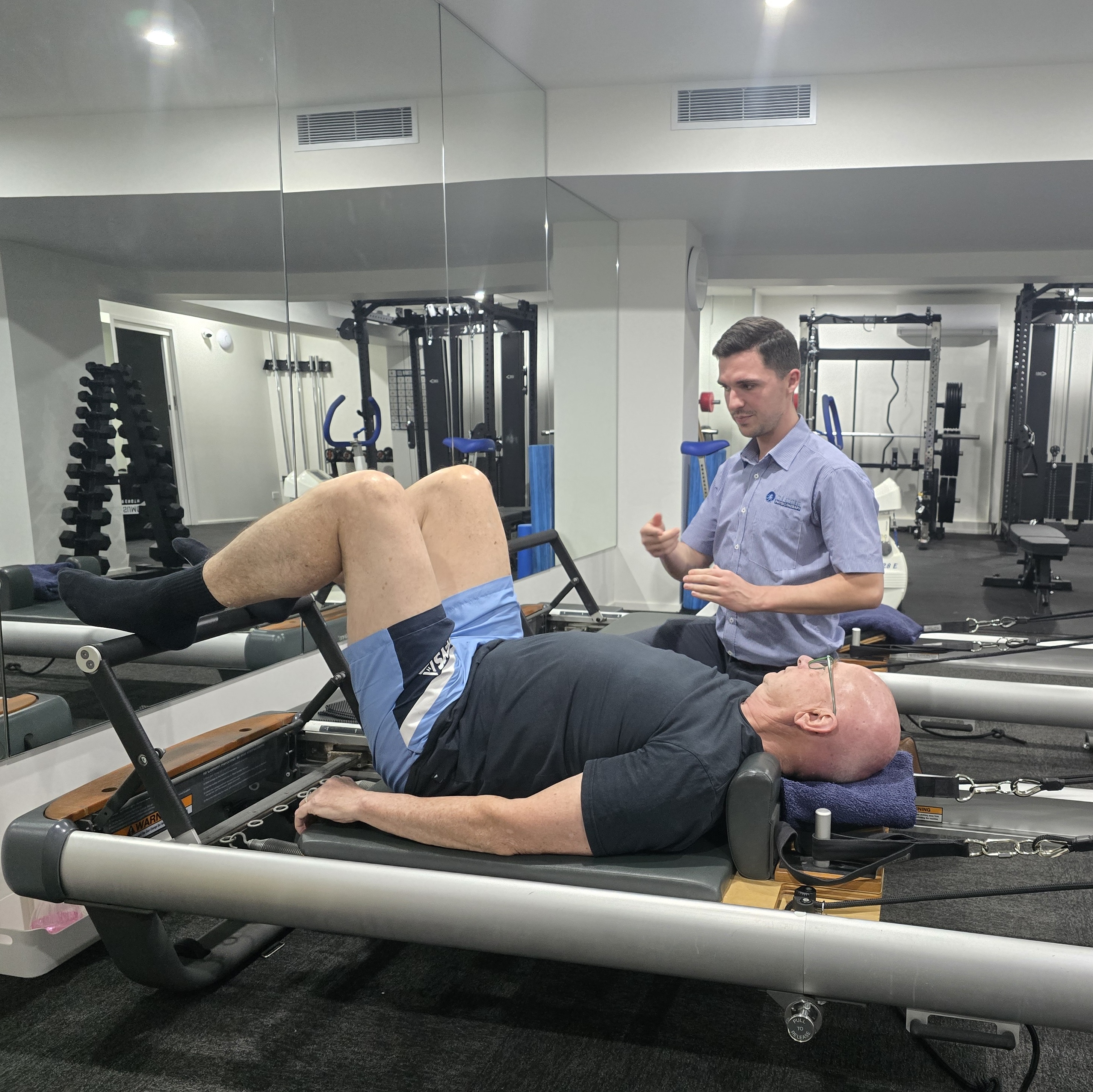Physiotherapist teaching Clinical Reformer Pilates
