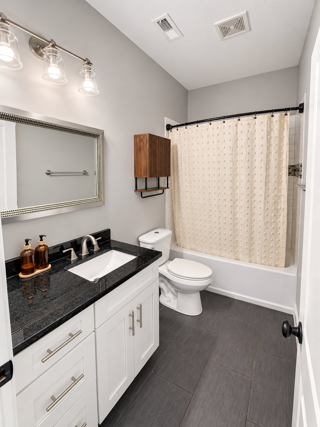 Full hall bathroom with tub and shower