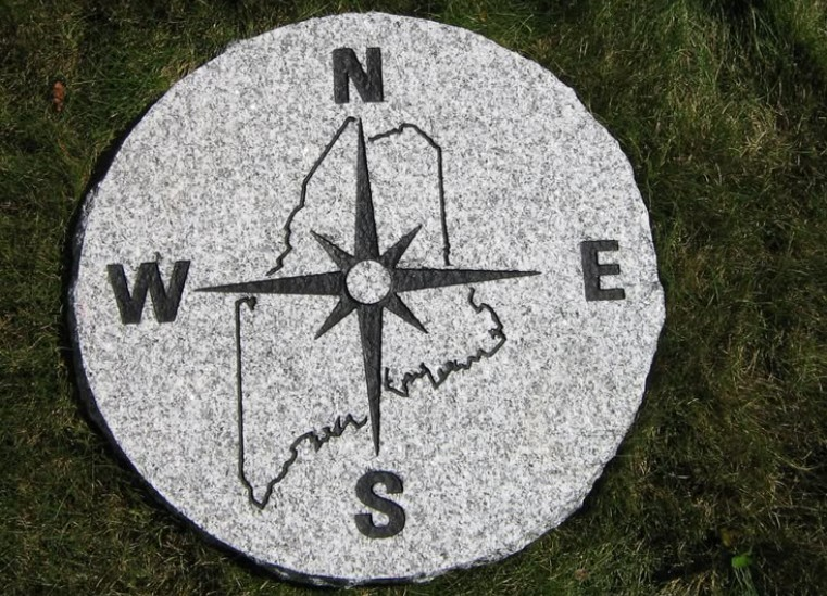 Granite compass rose with Maine state outline