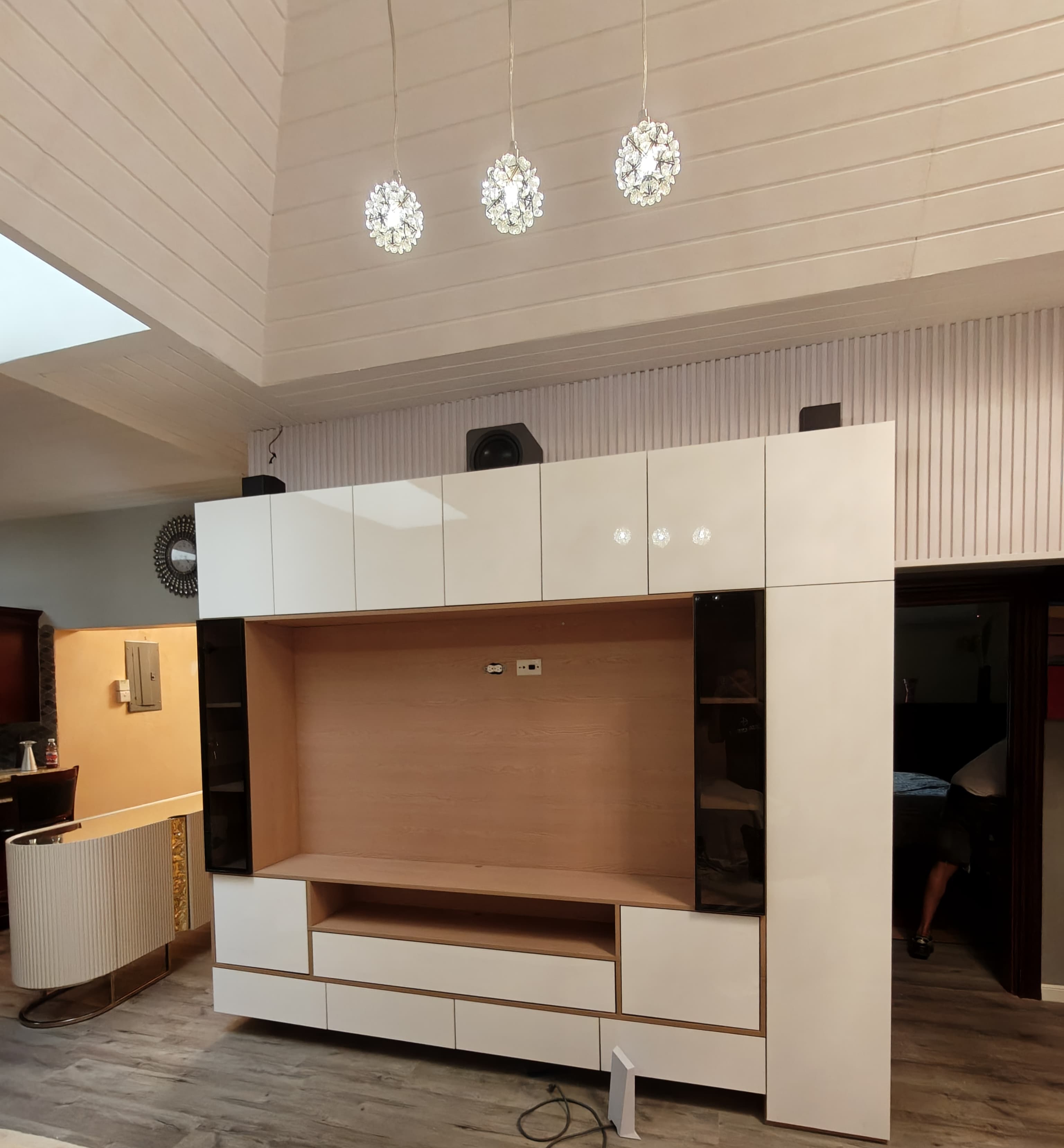 Real TV wall with built-in storage installed by Dream House Cabinet