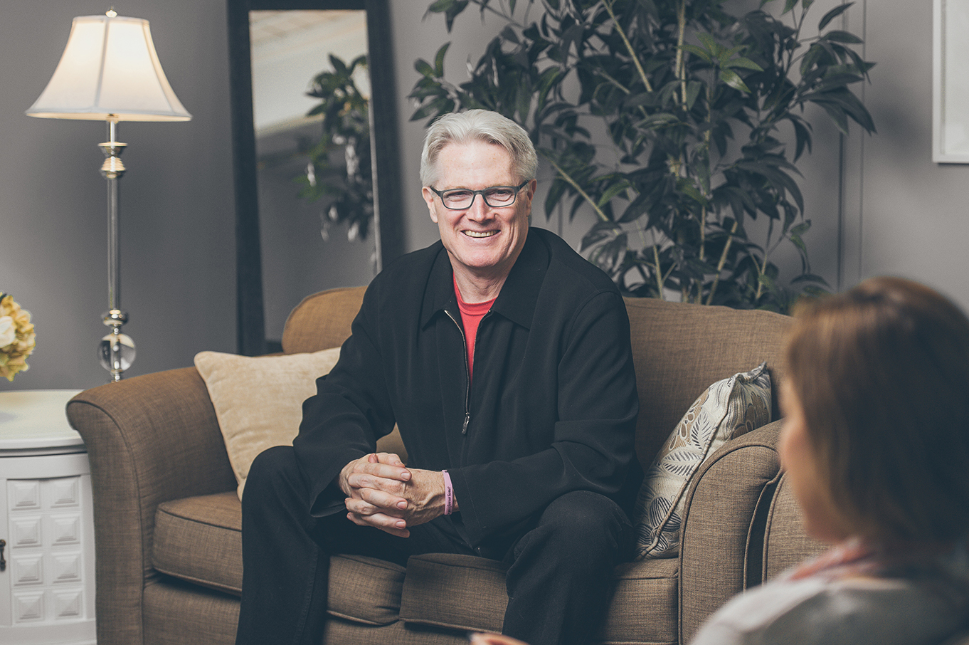 John Marshall, founder of Coach Craft Academy, smiling during a coaching session with a client