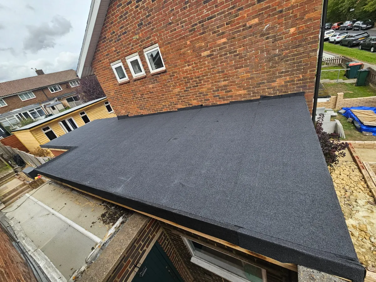 Roofing contractor in Billingshurst: new felt flat roof on an extension