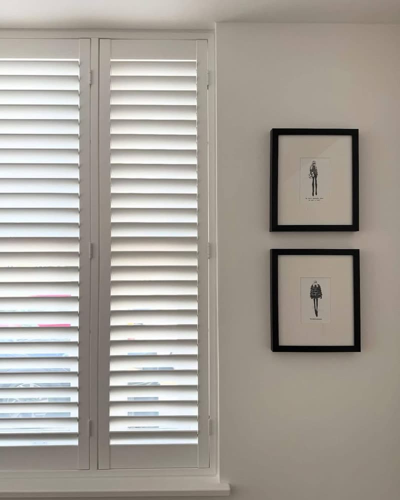 Full height white plantation shutters