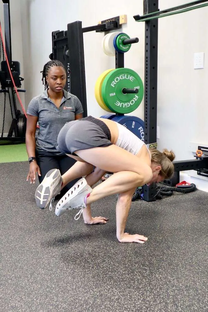 Dr. Nia Kenya coaching a patient at Movement Solutions Greenville SC