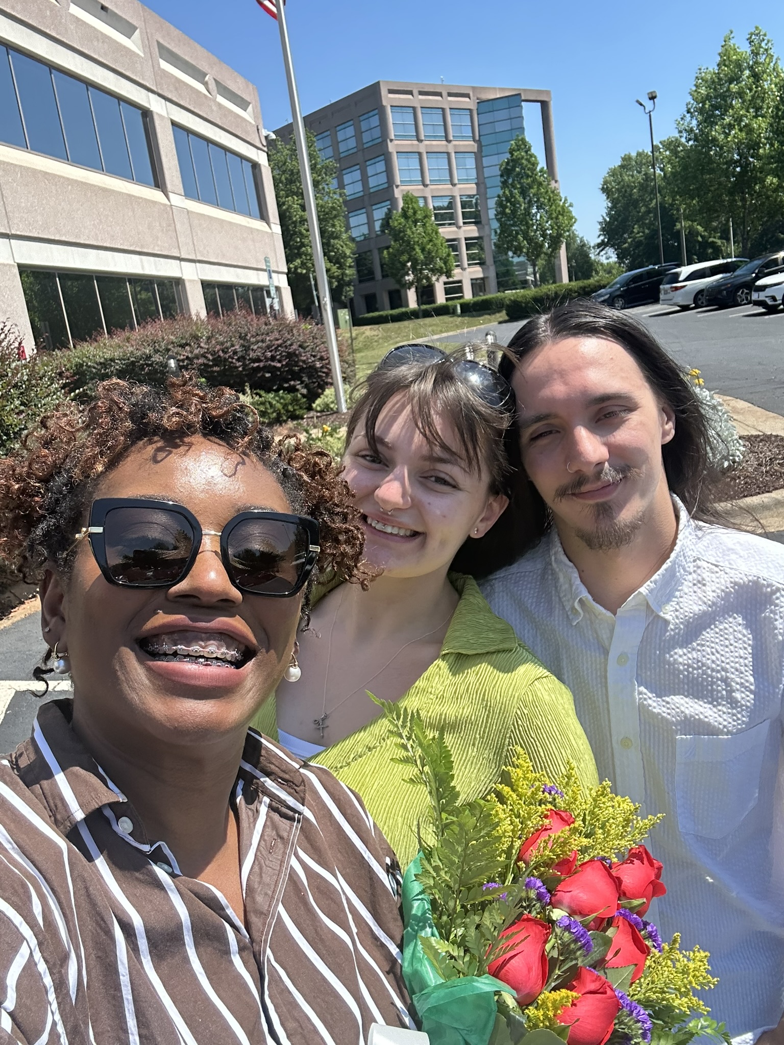 Attorney Ify celebrating with clients after their interview