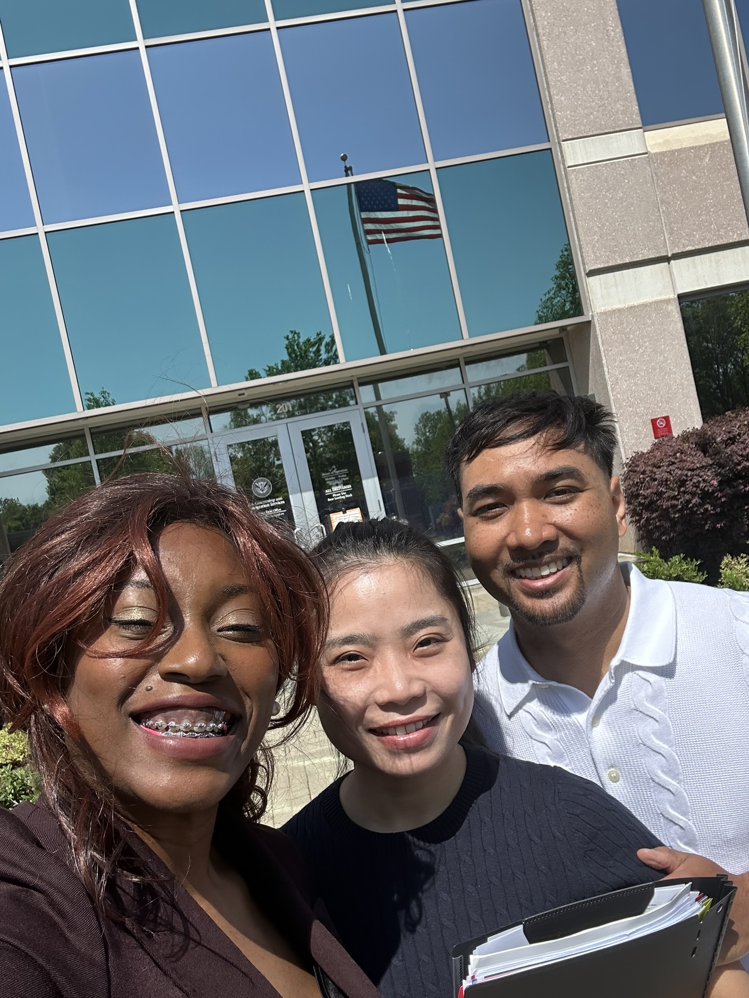 Attorney Ify with clients on interview day