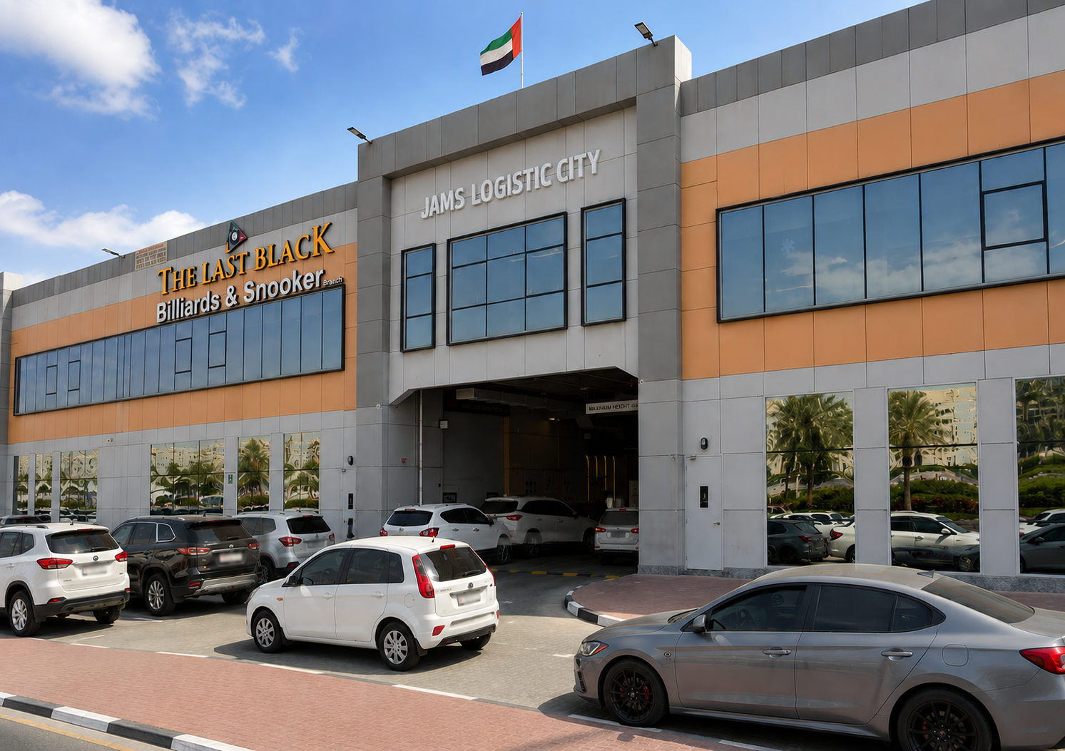 Parking area and entrance to JAMS Logistic City, home of Scarab Coffee.