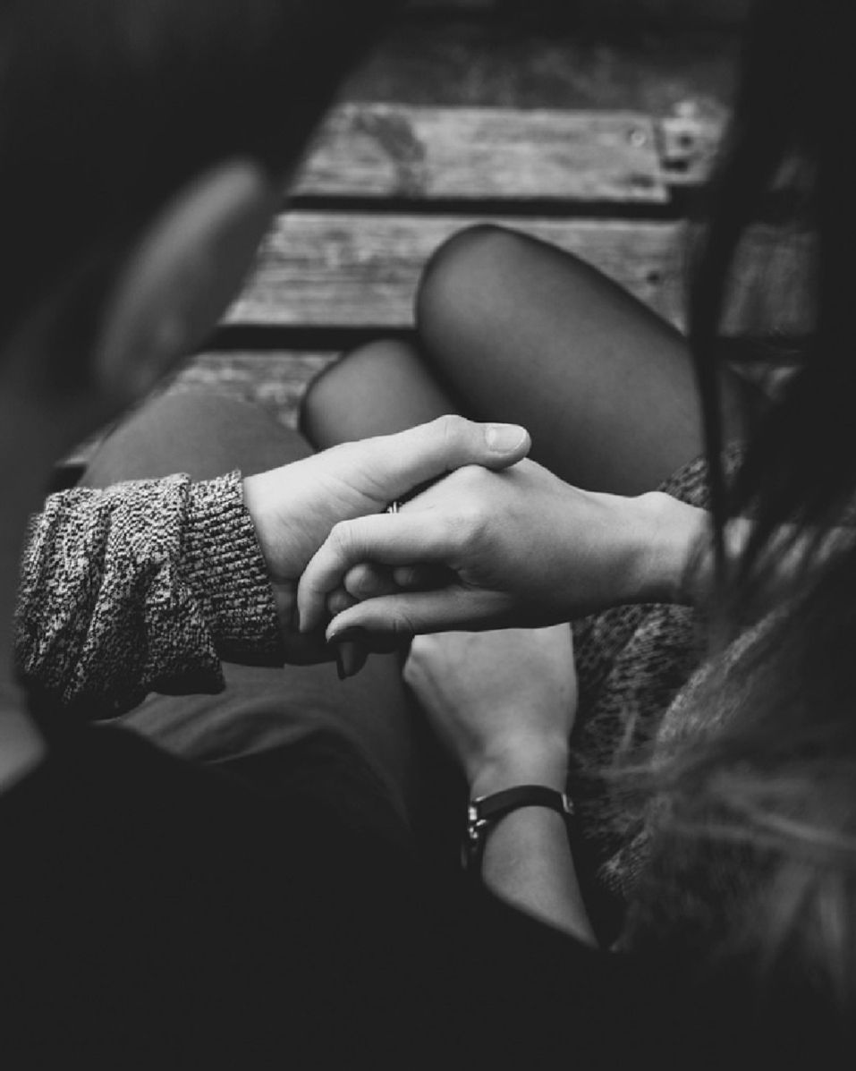 a couple holding hands, wishing they were not stuck in the same cycle of conflict