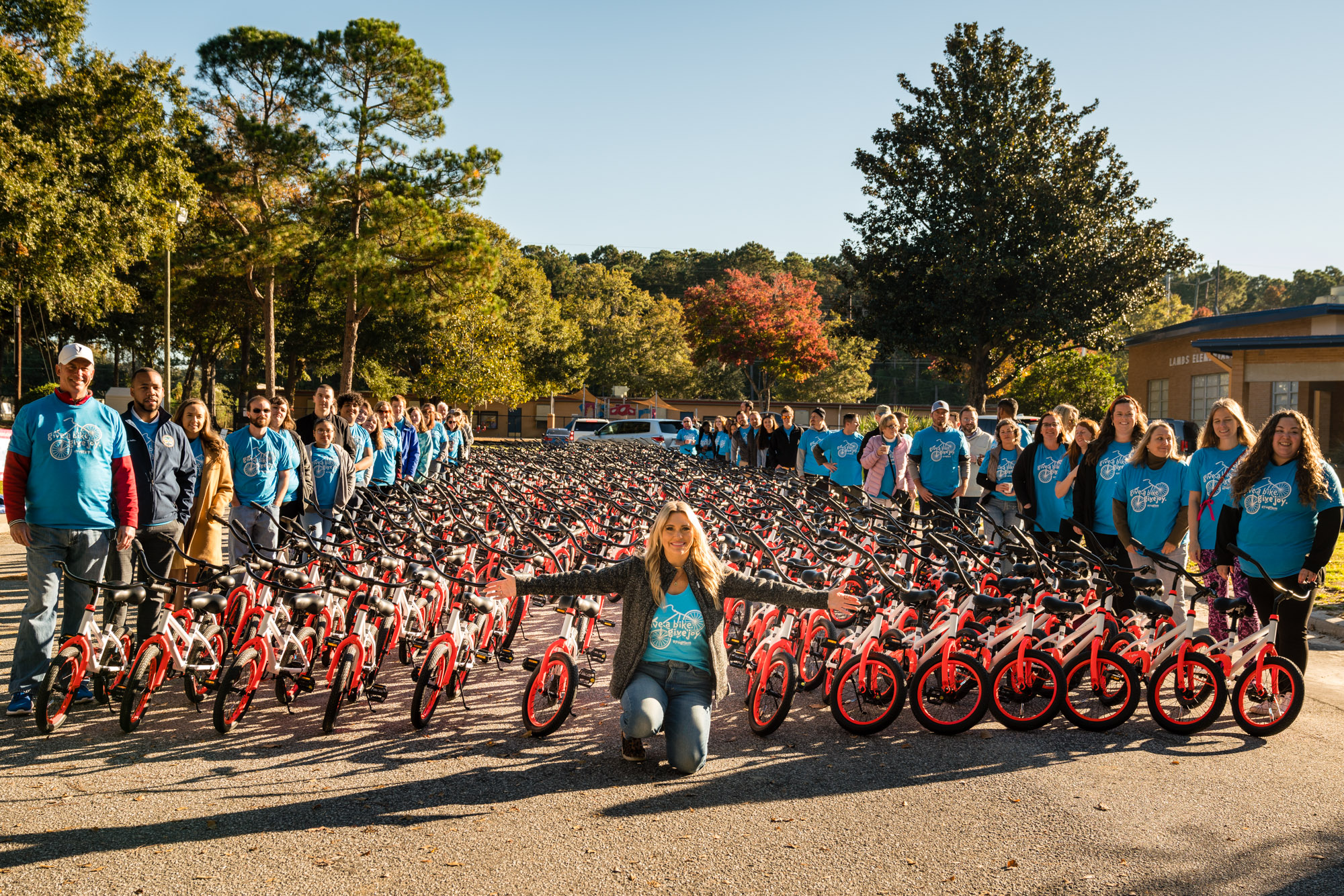 Children celebrating at a Going Places bike reveal