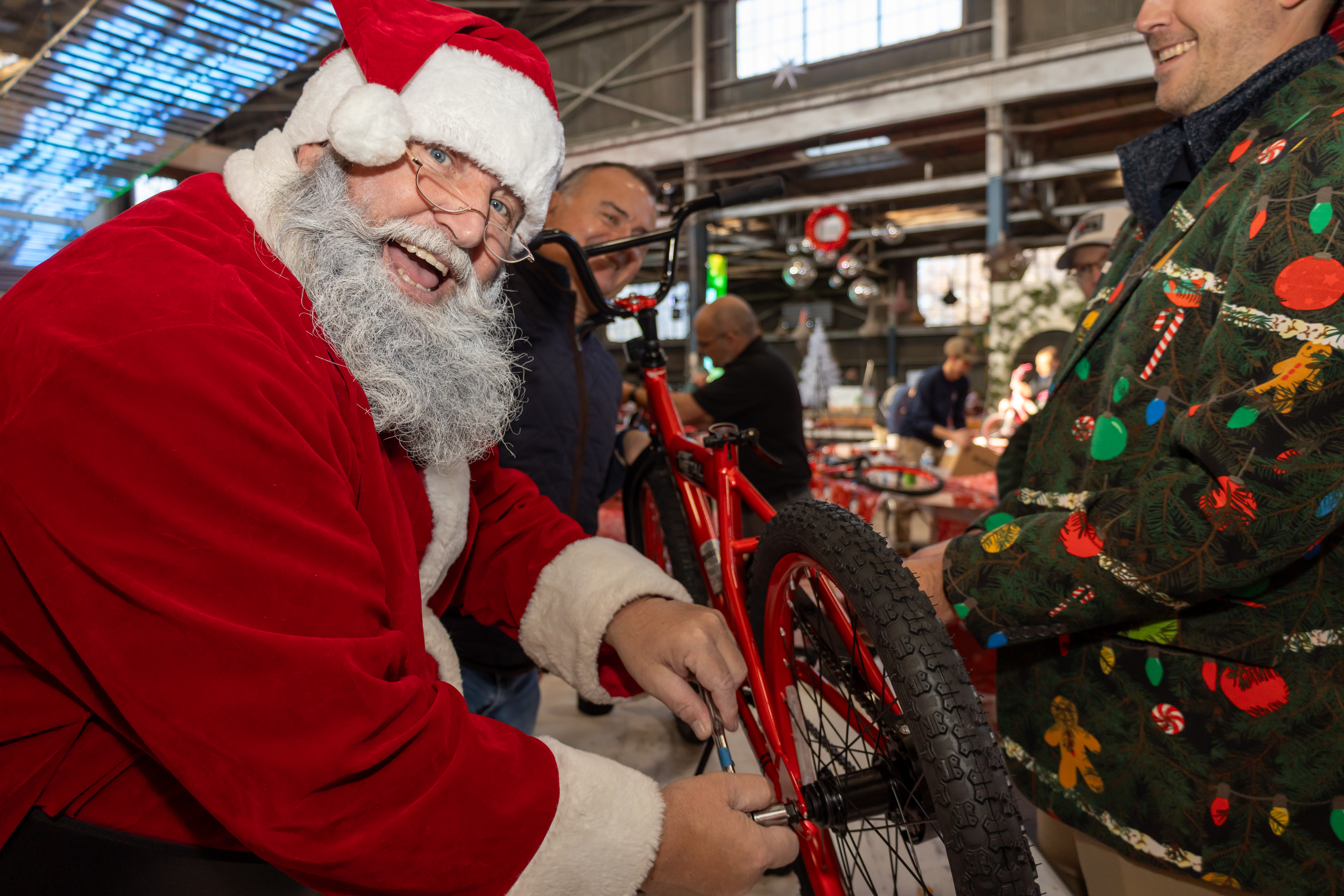 A crew celebrating a finished bike