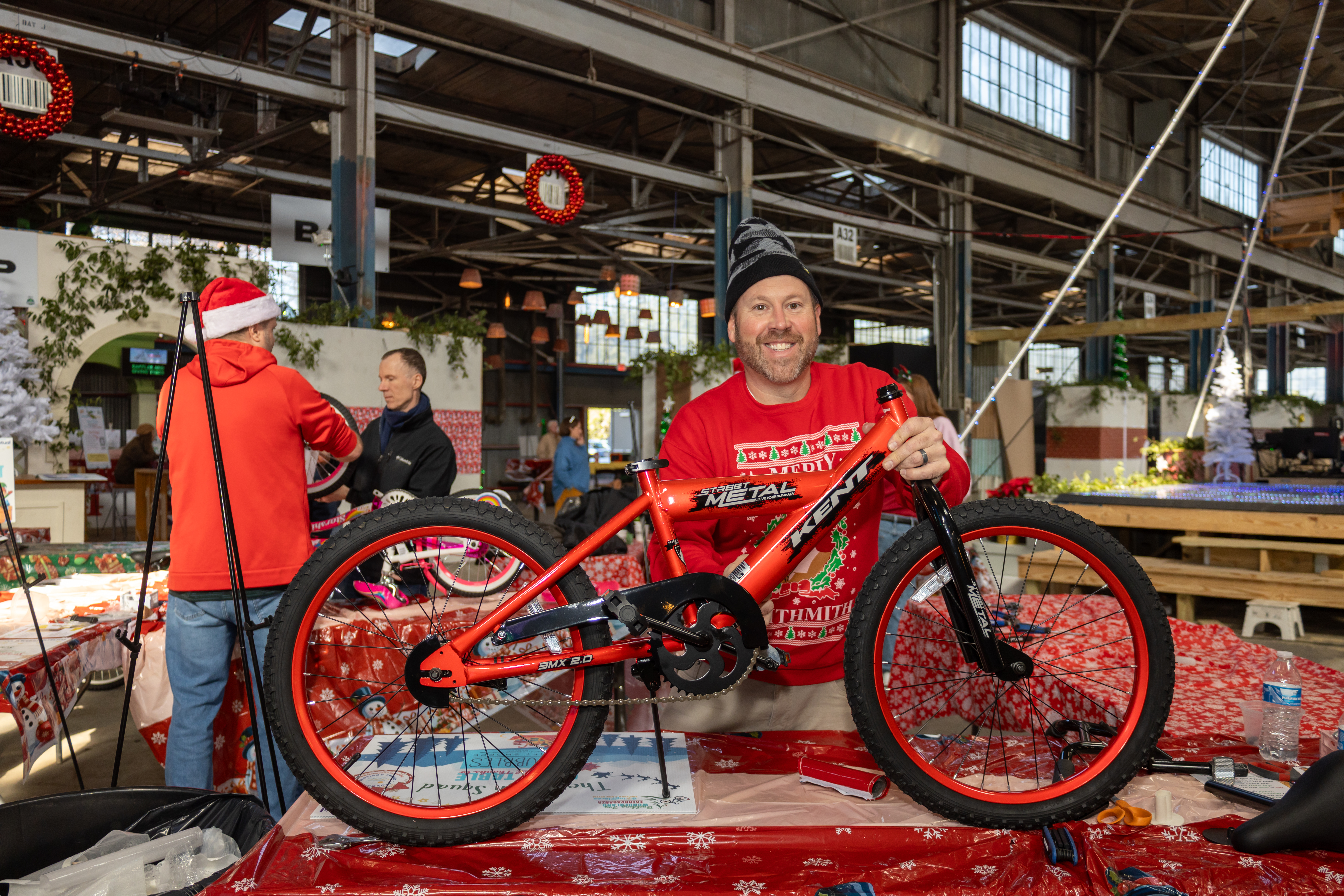 Team building bikes together on the build floor