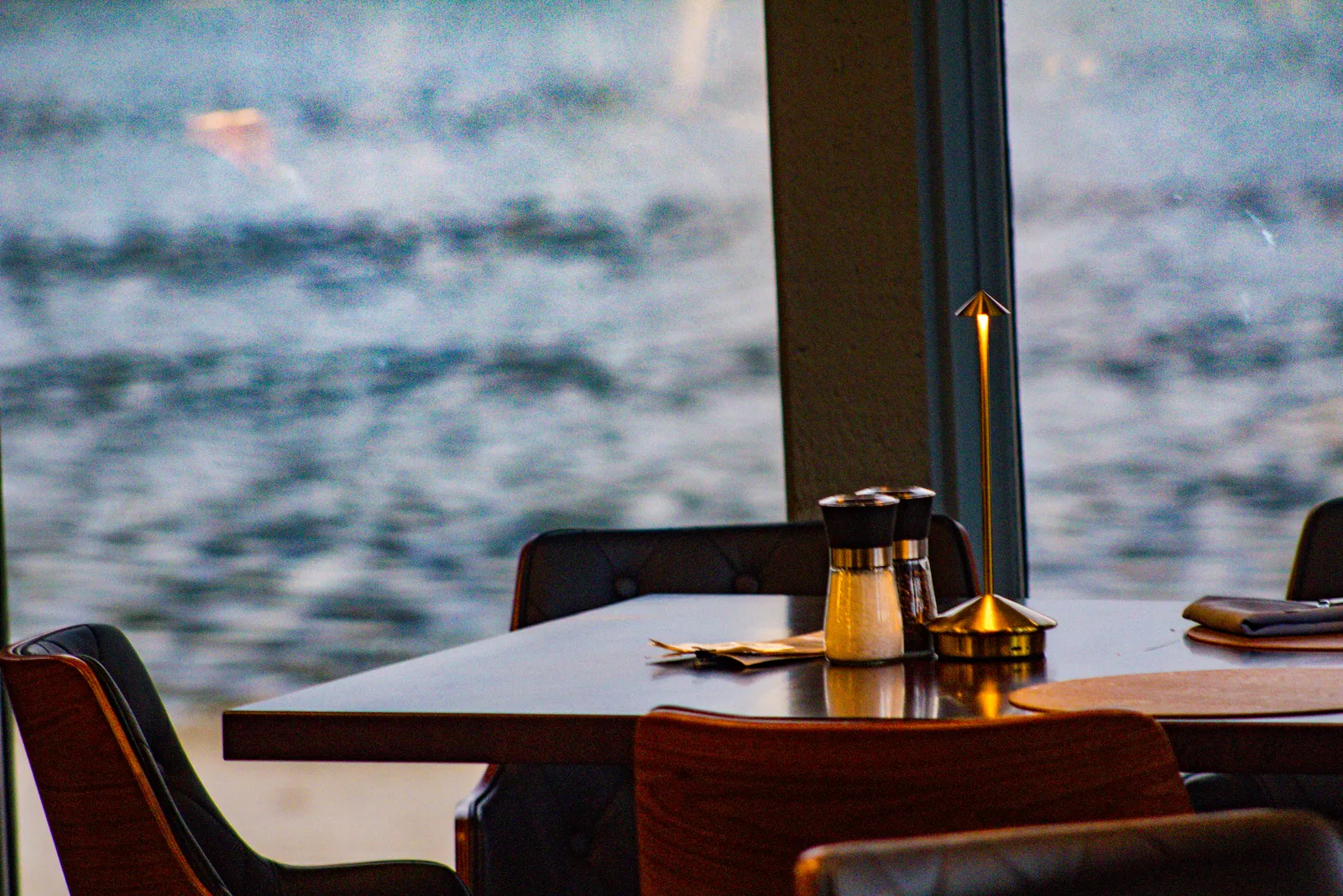 Gold lamp dining table with lake view