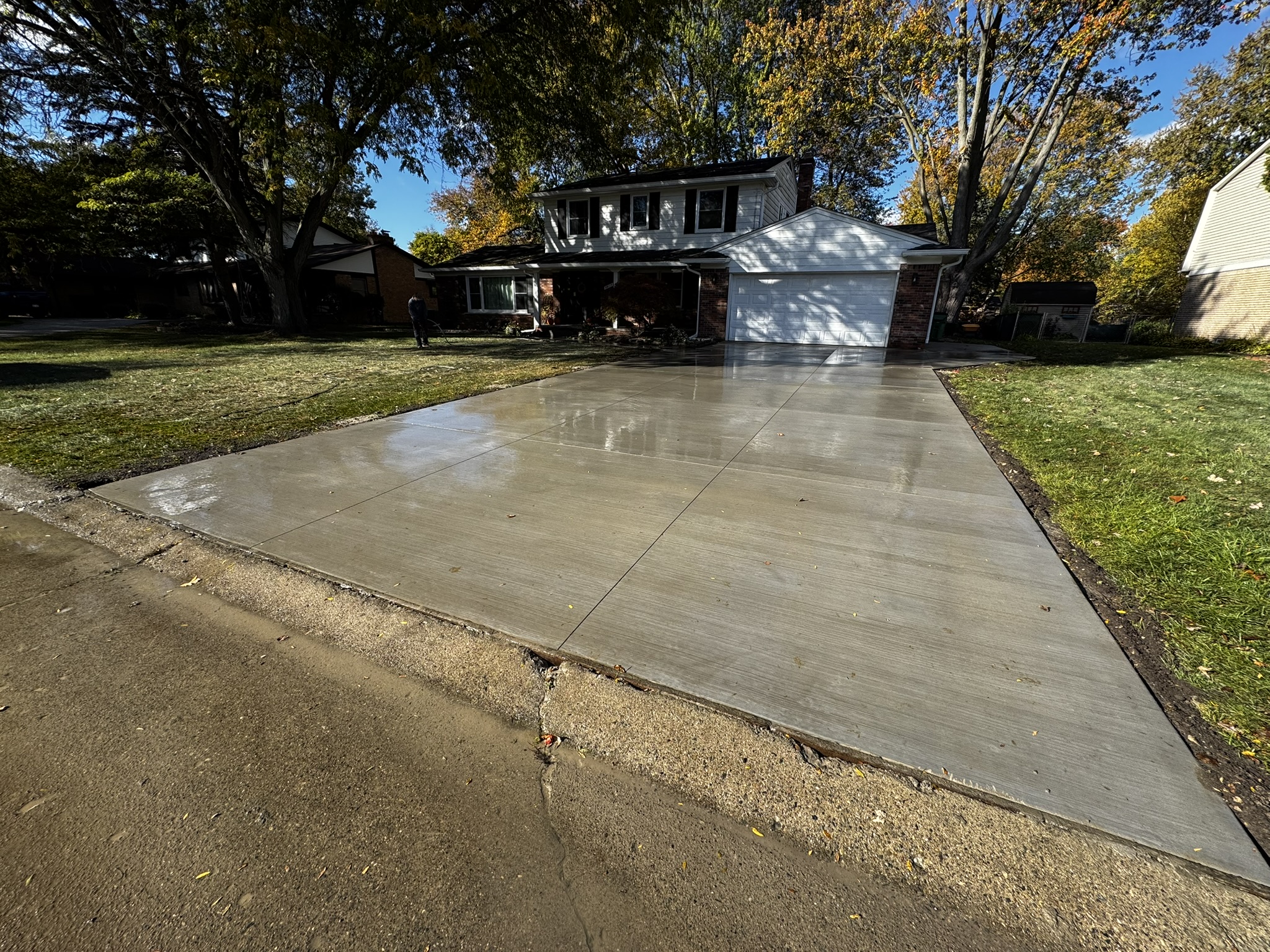 New concrete driveway replacement at a Metro Detroit home