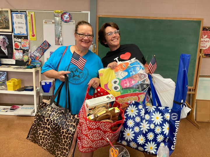 Teacher shopping the free supply room