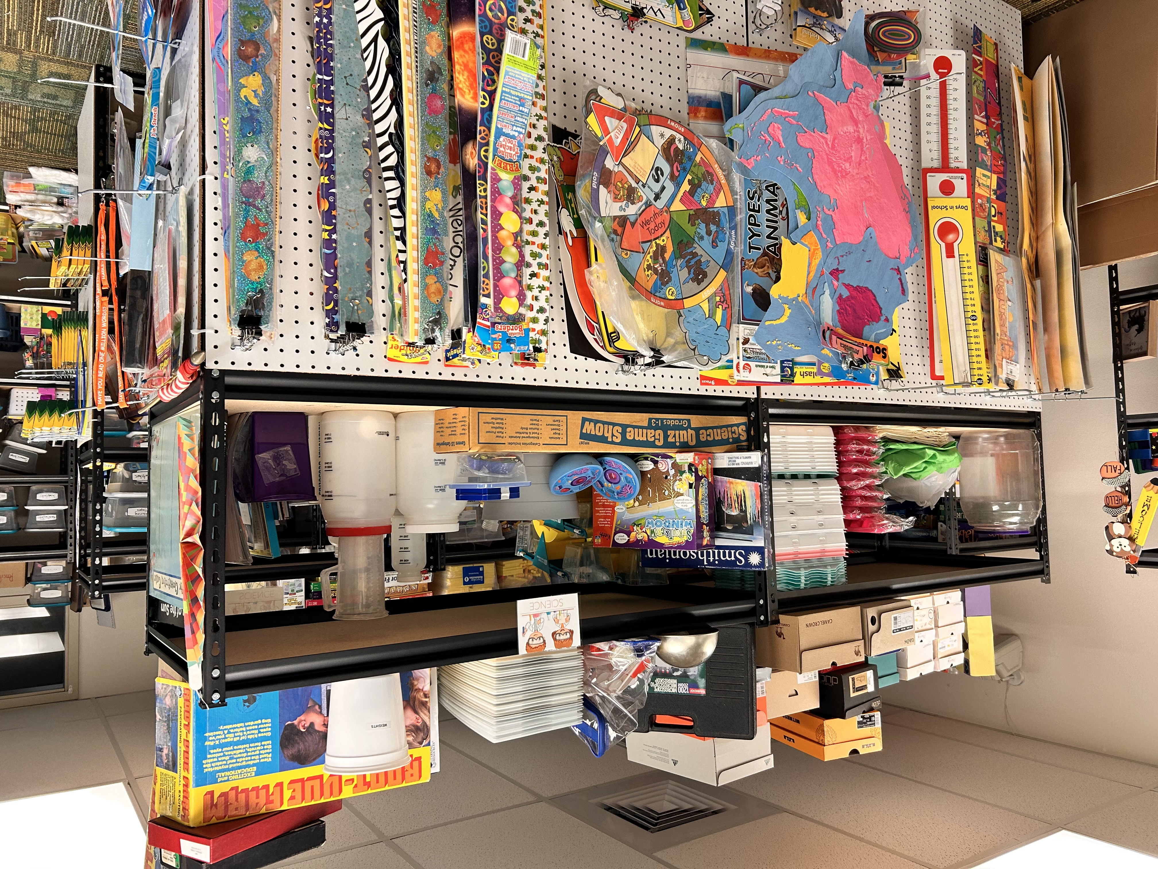 The Teacher Supply Room shelves stocked with donated classroom supplies