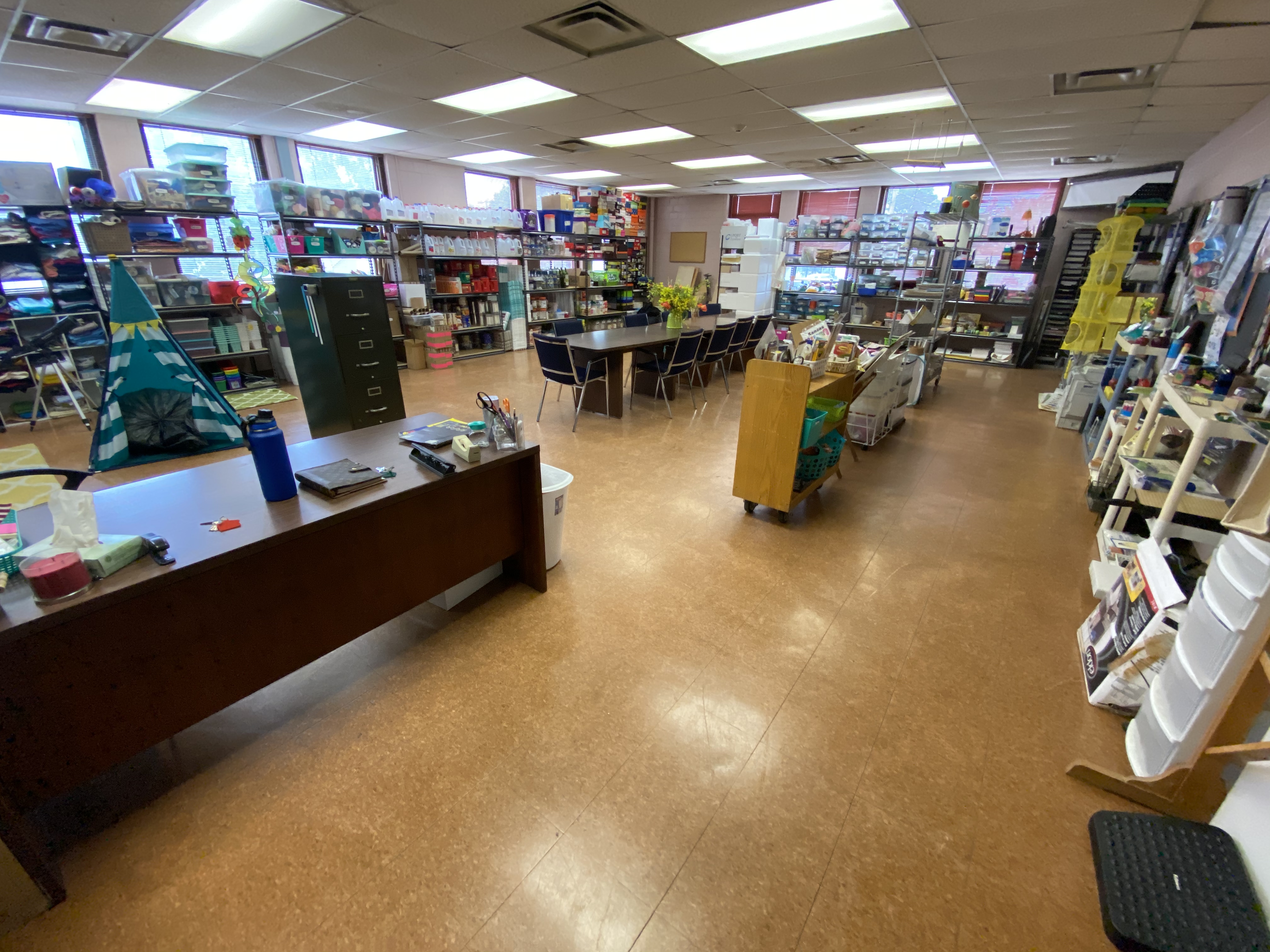 Teacher Supply Room shelves stocked with classroom materials
