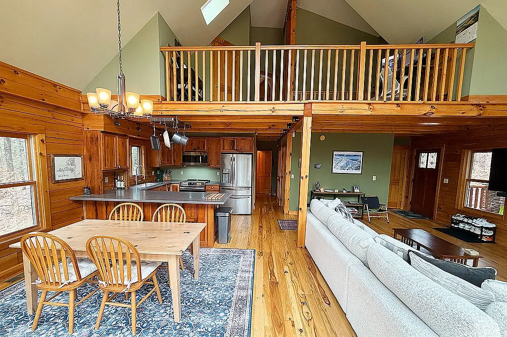 Kitchen with new stainless steel appliances and breakfast bar